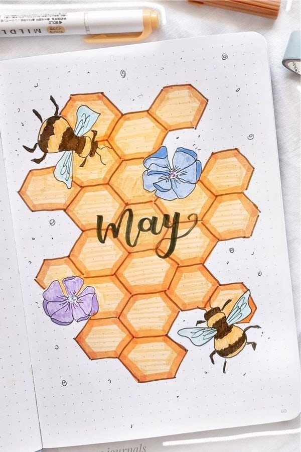 cover page for bujo with bee doodles