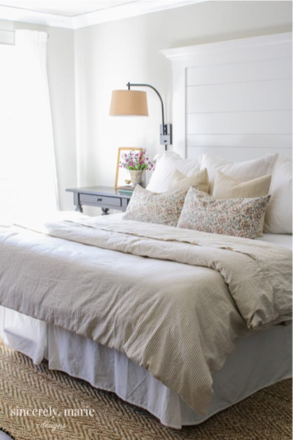 white painted head board with planked wood
