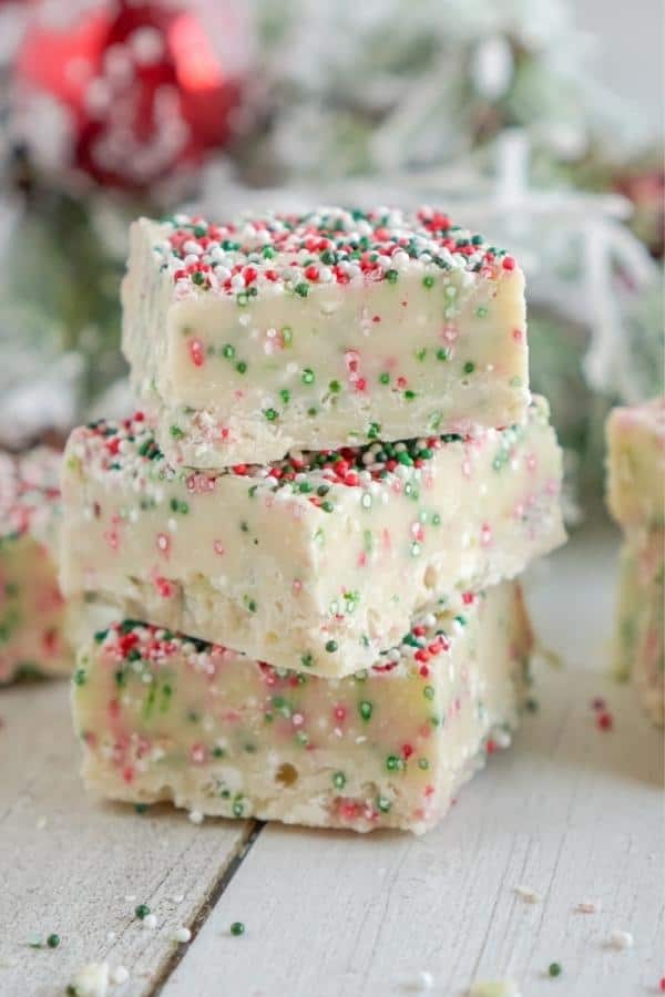 This easy-to-make fudge recipe uses sugar cookie mix and white chocolate to create a delicious holiday dessert!