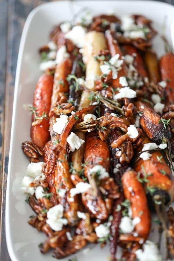 ROASTED CARROTS WITH CANDIED PECANS & GOAT CHEESE