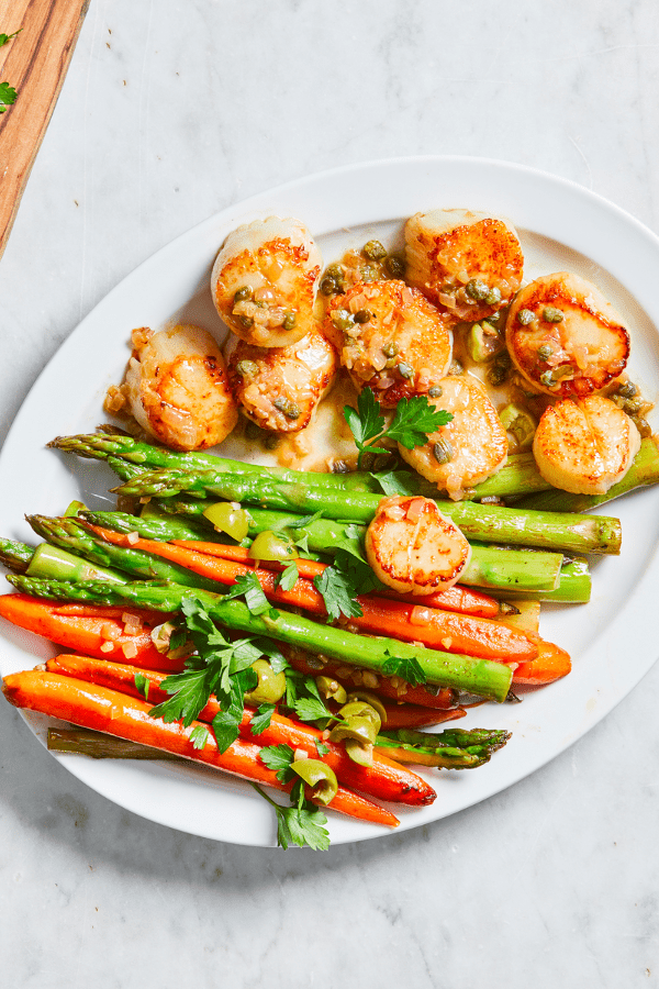 Scallops & Spring Vegetables with Olive-Caper Pan Sauce
