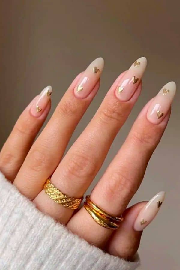 NUDE NAILS WITH A TOUCH OF GOLD ACCENTS
