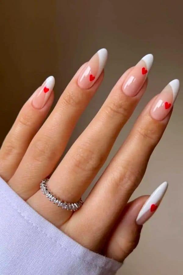 SIDE TIP FRENCH MANICURE WITH RED HEART ACCENTS