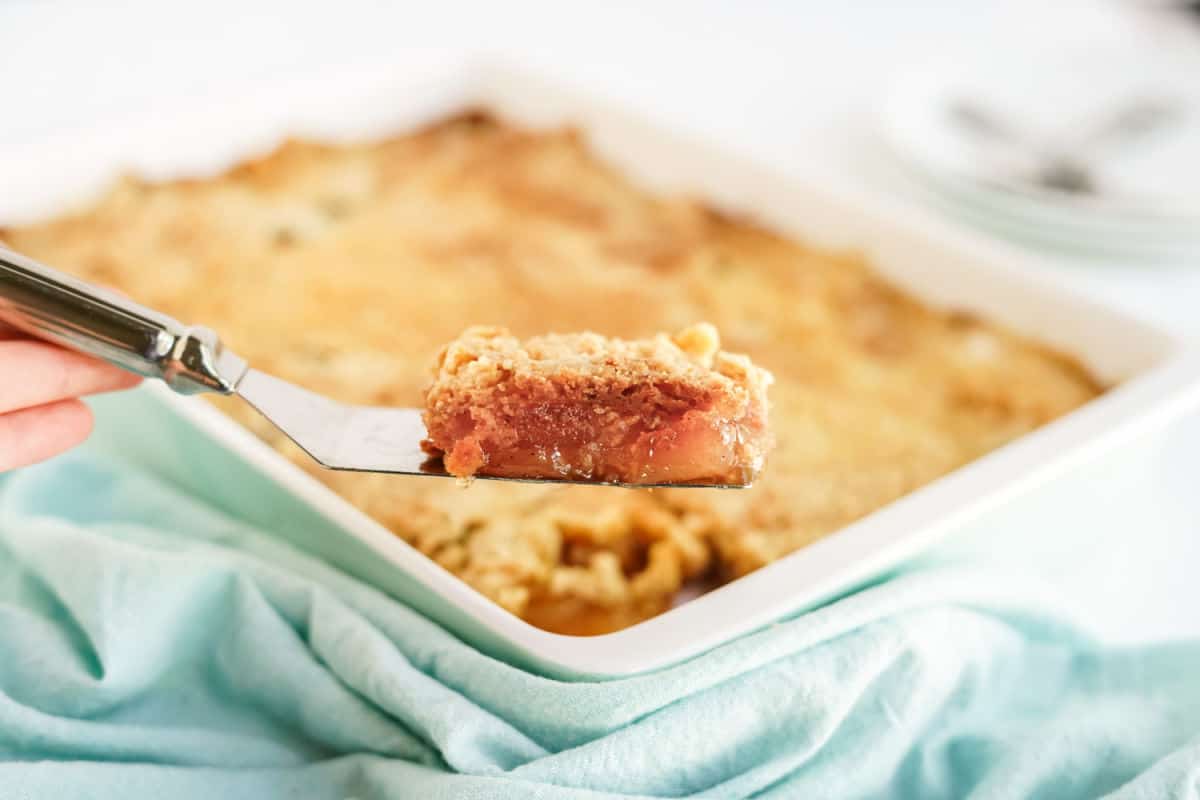 Apple dump cake with cinnamon and yellow cake mix, served from the pan