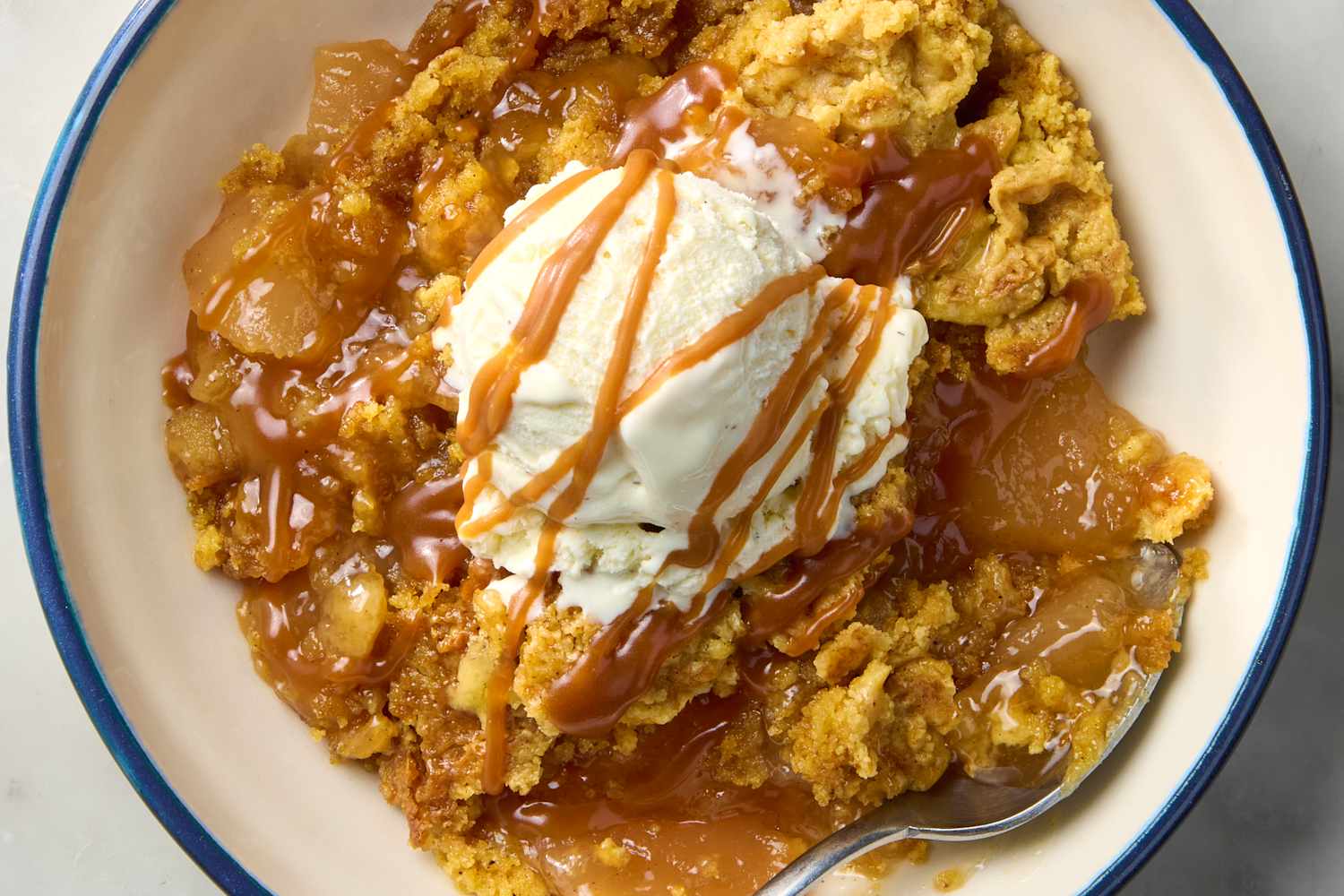 Four-ingredient caramel apple dump cake with a golden top