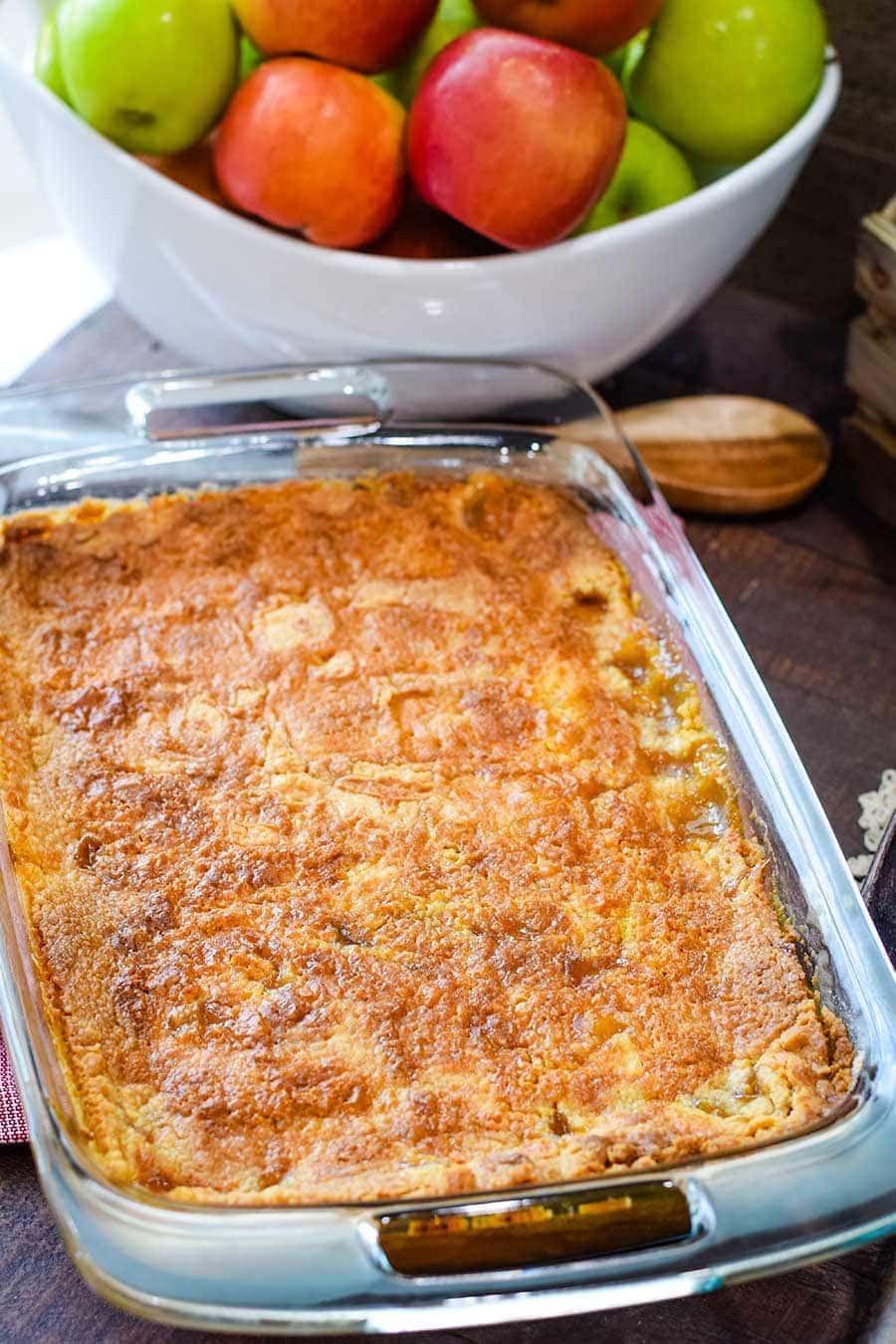 Caramel apple dump cake shown in its baking pan