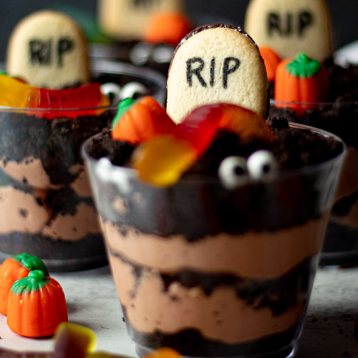 Halloween dirt cups with chocolate filling and tombstone toppers